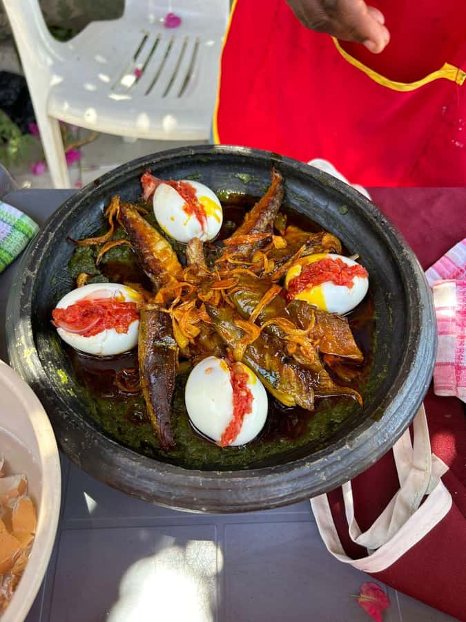 Accra: Cooking Class with Auntie KK in Osu - Preparing dishes such as jollof, banku, and kelewele