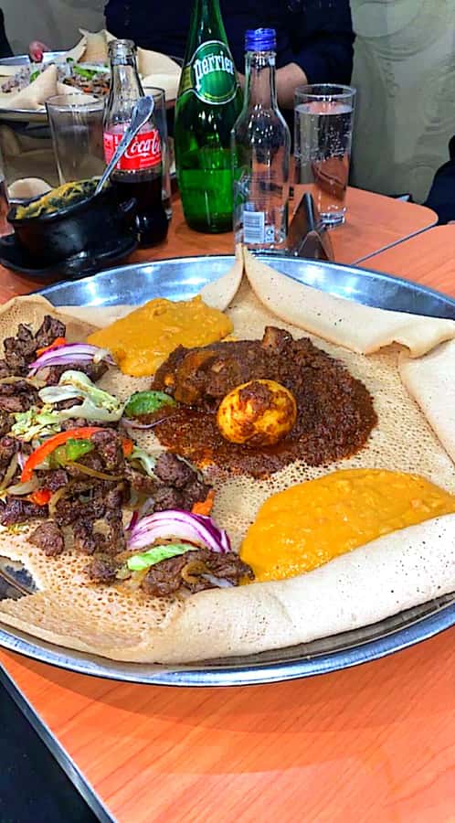 Addis abeba Full Cooking class. - Eating lunch that you helped prepare