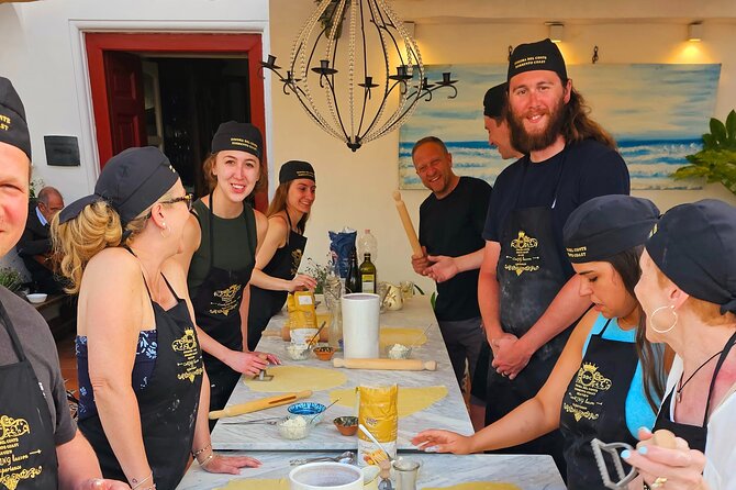 Authentic Pasta & Pizza Cooking Class with Sorrento Coast Pickup - Eating what you made, with wine and music