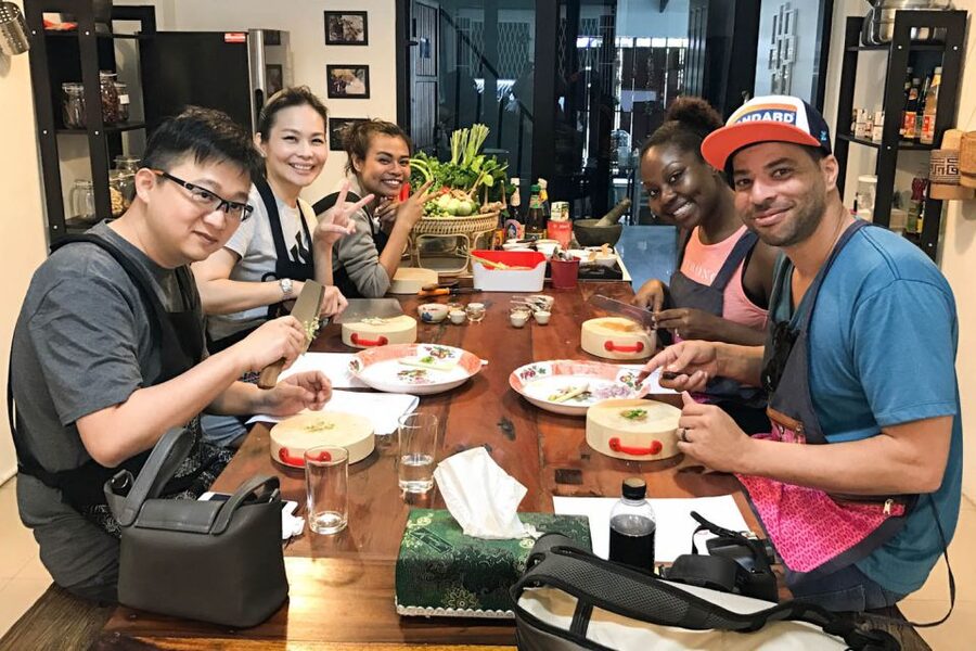 Bangkok: Thai Cooking Class and Onnuch Market Tour - Returning to the kitchen with four dishes ahead