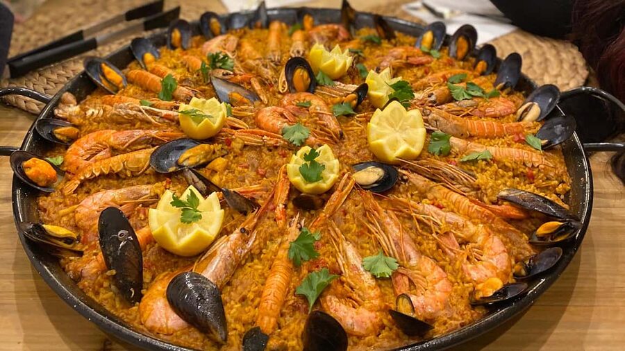 Barcelona Evening Cooking Class: 5-Course, 3 Paellas & Cava - Rotating Teams and Hands-On Paella Work