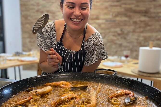 Barcelona Paella Cooking Class & Boqueria & Hofmann-Trained Chefs - Pan con tomate, jamón, and a first glass of cava