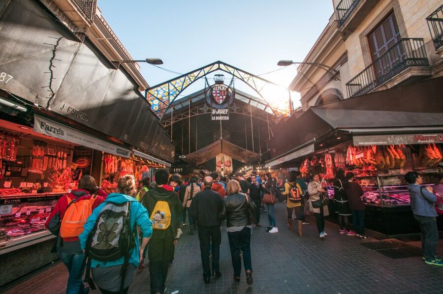 Barcelona: Paella Cooking Experience & Boqueria Market Tour - Walking from the market to the cooking room
