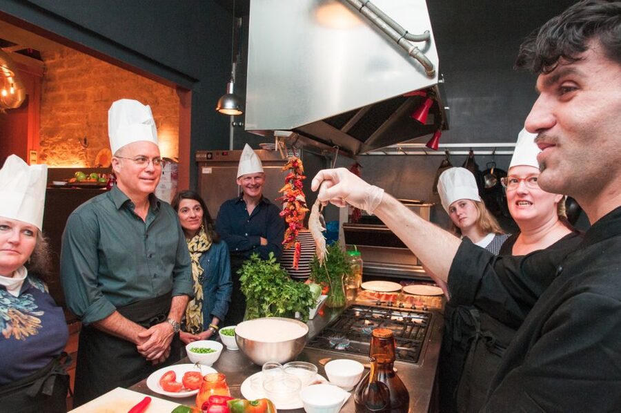 Barcelona: Paella Cooking Experience & Boqueria Market Tour - Pan con tomate and small tapas first