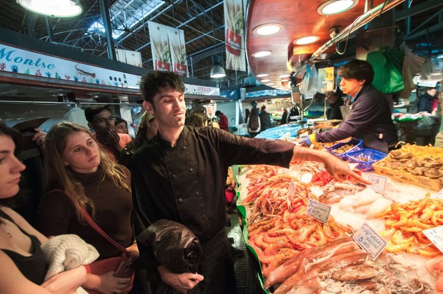 Barcelona: Paella Cooking Experience & Boqueria Market Tour - Taking part in the seafood paella