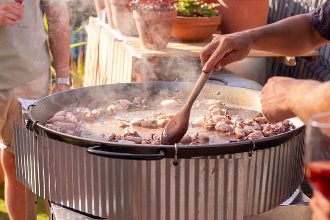 Barcelona Rooftop Paella Cooking Class with Sangria & Local Host - Making seafood paella from scratch