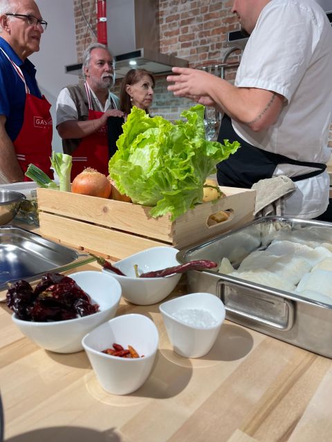 Bilbao: Basque Pintxos and Tapas Cooking Class - Eating your work with wine and local extras