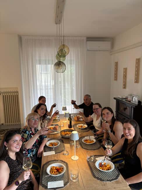 Bologna: In-Home Italian Pasta Making Workshop with Wine - Homemade pizza and wine set the evening in motion