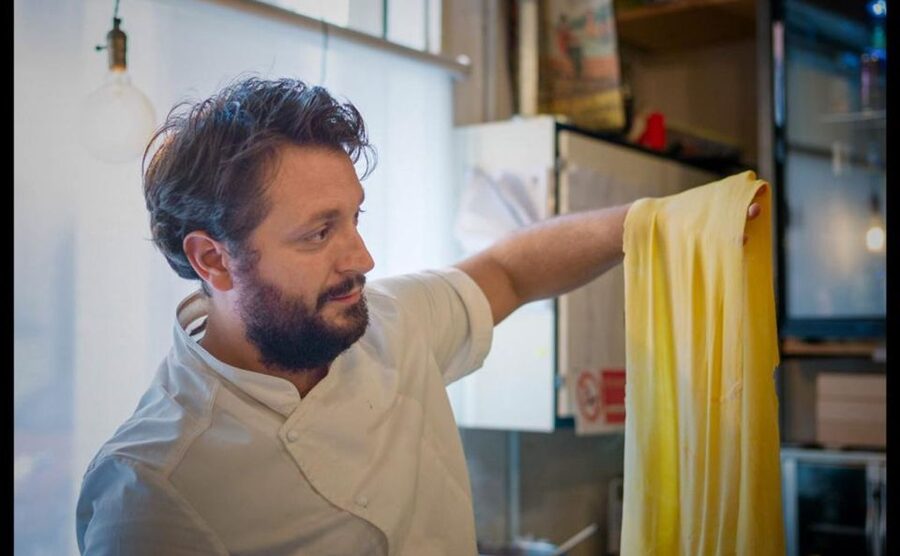 Bologna: Pasta Secrets Cooking Class with Local Expert - Entering Drogheria degli Elefanti in central Bologna