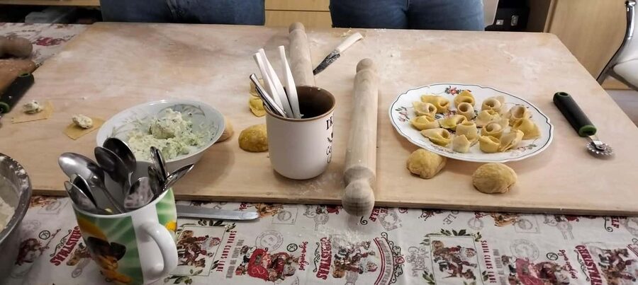 Bologna: Pasta Tagliatelle al Ragu Cooking Class with Wine - Sitting down to eat your own pasta