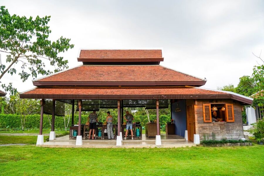 Chiang Mai: Authentic Cooking Class with Market & Farm Visit - Cooking at your own station