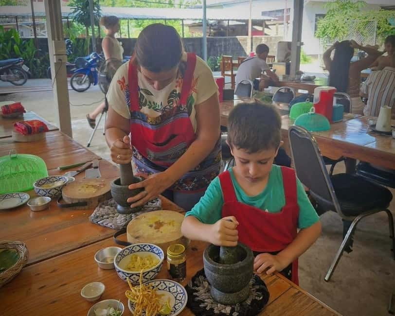 Chiang Mai: Cooking Class, Market & Thai Herbs Garden Tour - Cooking several dishes, then sitting down to eat