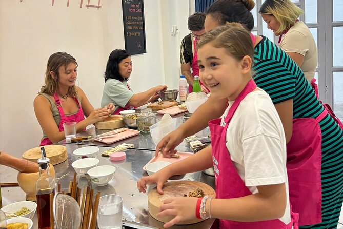 Cook 4 Local Vietnamese Dishes In Pink-themed Class & Market Tour - A market-first introduction to Vietnamese food