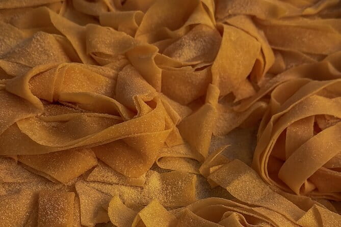Cooking Art Brunelleschi with Unlimited Wine - Making pasta in a Florence tower