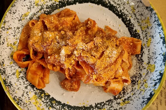 Cooking Class in Rome: Make Fettucine & Tiramisù with Chef Paolo - Sitting down for pasta, wine, and limoncello