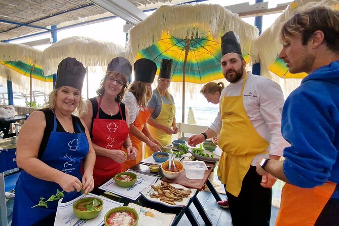 Cooking Class on the Amalfi Coast with Tasting Included - Wine, olive oil, and the meal afterward