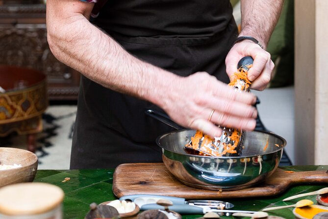 Cooking Course with Lunch & Pool Access in Day Pass - Eating the meal in a Marrakech riad
