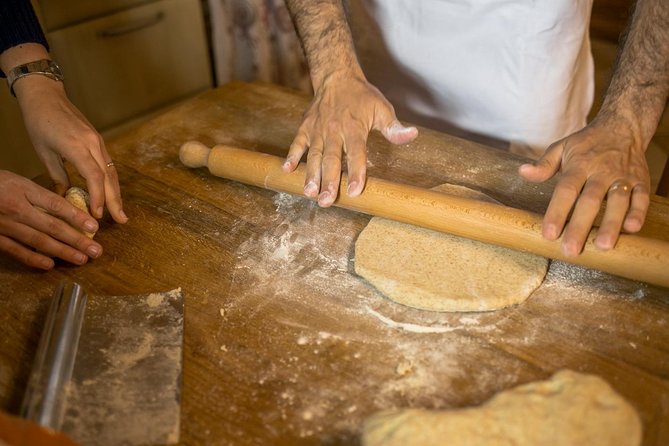 Dining experience at a local's home in Asti with show cooking - Walking into the kitchen and meeting your Cesarina