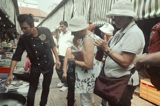 Experience half-day cooking class with market visit - A welcome drink and the Kitchen God story