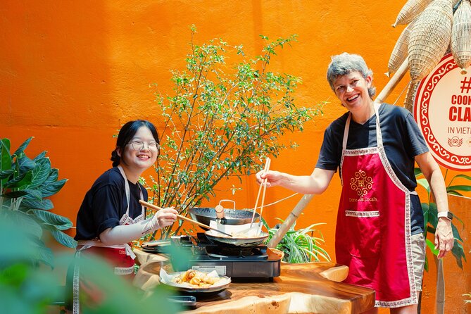 Experience Hanoi Cooking Class with Free Wine Tasting - Key points at a glance