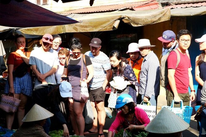 Experience Local Market and Boat Ride with Cooking Class - What the guide adds to the day