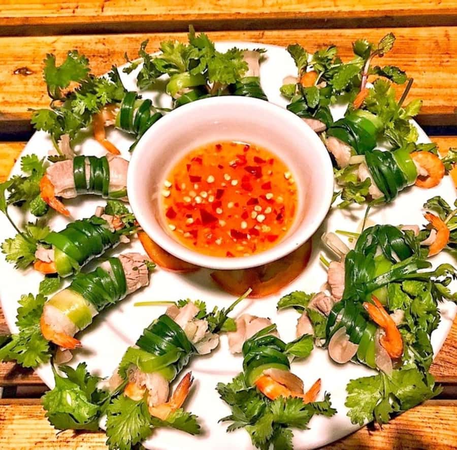 Experience Tra Que Cooking Class with Locals in Herb Village - Cooking in the garden at Tra Que Herb Village