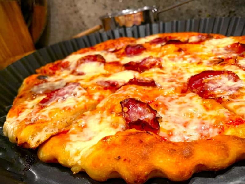Family-Style Italian Pizza Cooking Class & Dining Experience - Dinner, wine, and a grandmother’s tiramisu