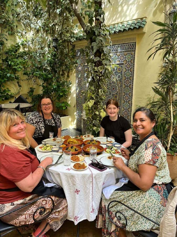 Fes: Authentic Cooking Class and Old Medina Visit - Cooking three Moroccan courses with the chefs