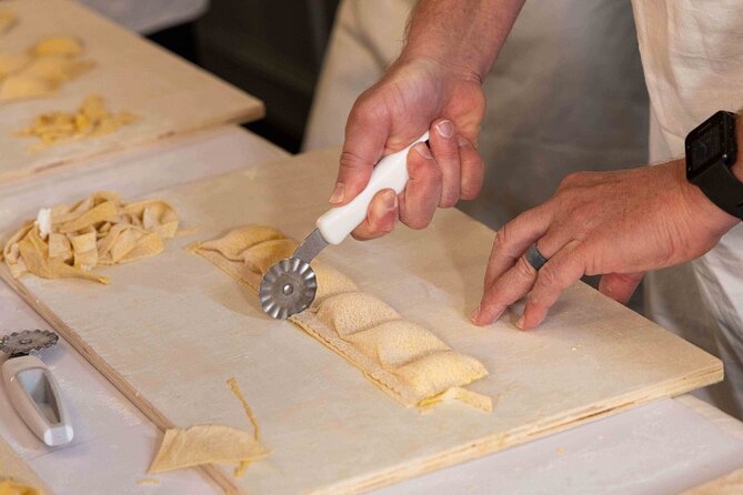 Fettuccine Ravioli and Tiramisu Cooking Class in Rome - From worktables to a shared Roman meal