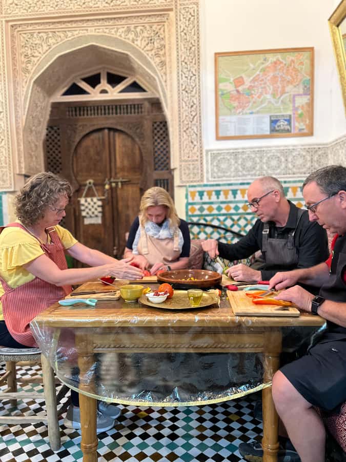 Fez: Souk Tour and Traditional Home Cooking Class - Cooking with Amal and Yassine