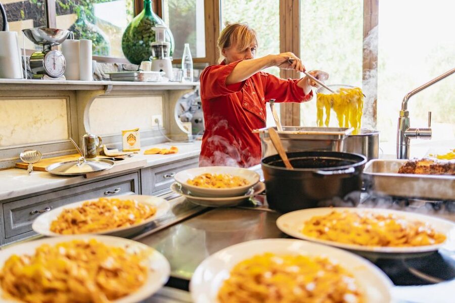 Florence: Cooking Class at a Tuscan Farm & Local Market Tour - Sitting down to the meal you made