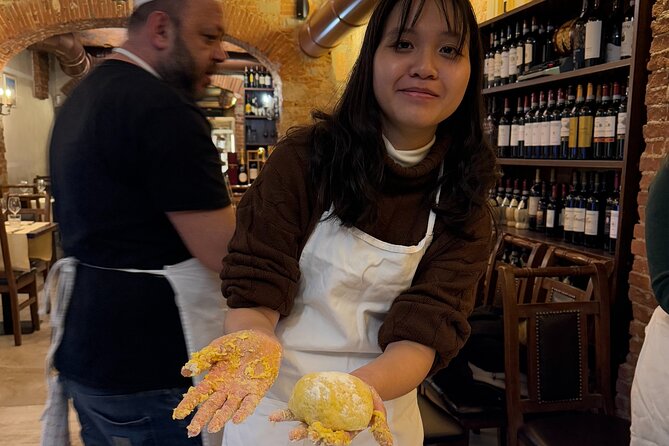 Florence: Pasta & Tiramisu Cooking Class with lots of Good Wine - Sitting down to eat pappardelle, ravioli, and dessert