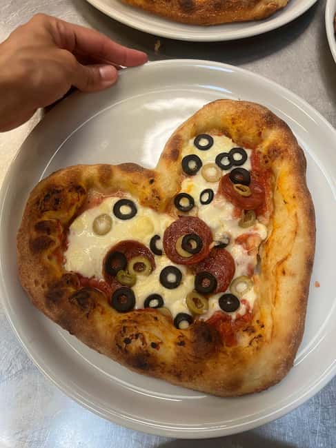Florence: Pizza and Gelato Cooking Class - Sitting down to eat what you made