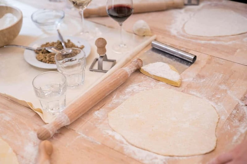 Florence: Premium Pasta Cooking Class with Tiramisu & Wine - Cooking pasta where Medici history began