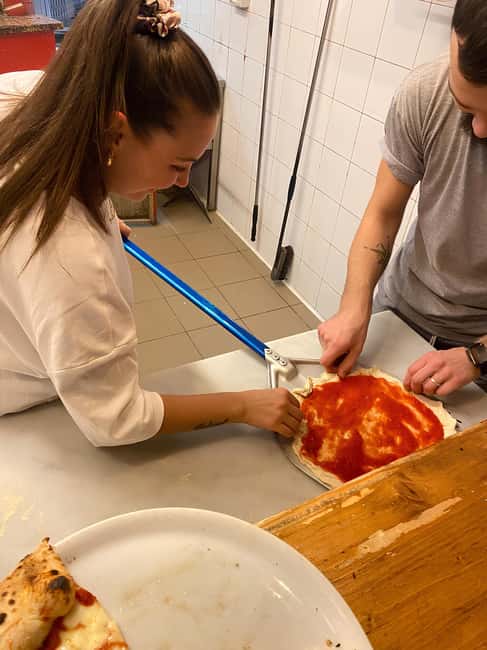 Florence: Private Pizza Making Class with Wine Tasting - Managing the wood-fired oven