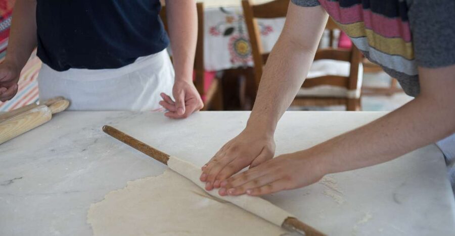 From Mykonos: Mykonian Farm Baking Class with Brunch - Kneading dough with Mike