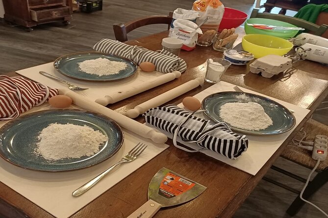 From Rome: Pasta & Tiramisù Cooking Class near Spanish Steps - Cutting Fresh Pasta Into Strands