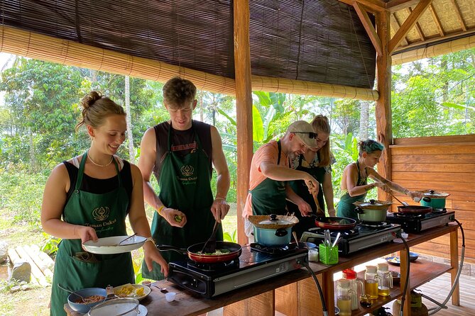 From Ubud: Authentic Bali Farm Cooking School & Organic Farm - Picking ingredients in the organic garden
