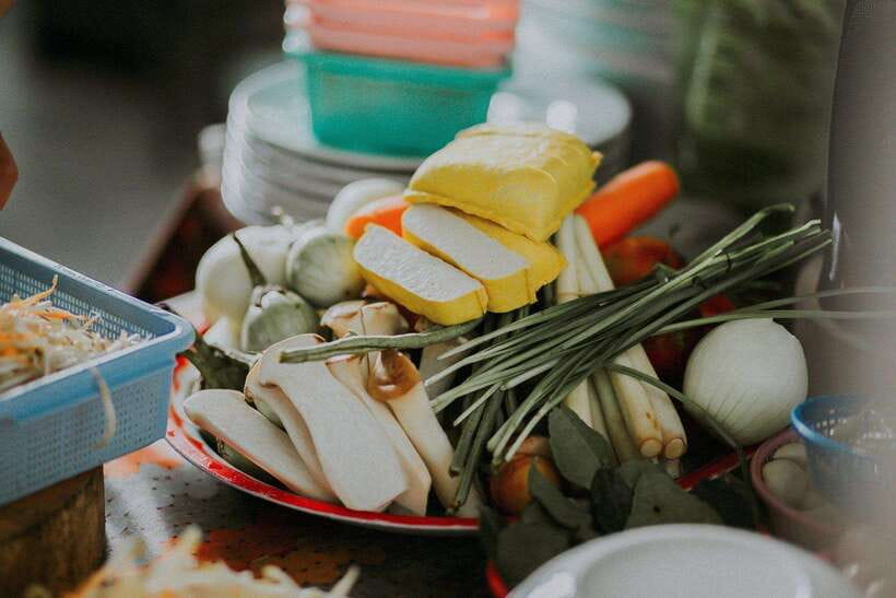 Full Day Thai Cooking Class in Organic Farm and Market - Eating what you prepared in the kitchen garden
