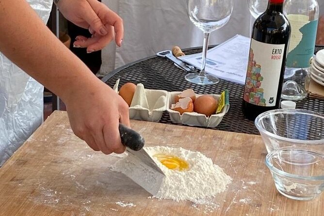Genoa: Hands-On Home cooking Class Pasta Pesto and more with wine - Sitting down to the lunch you made