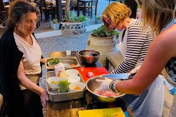Greek Cuisine Cooking Class in Santorini with Recipes and Wine - Cooking Greek food in Megalochori