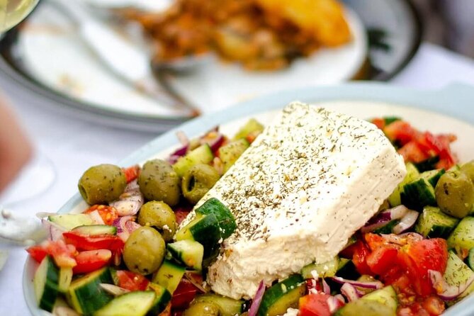 Greek Cuisine Cooking Class in Santorini with Recipes and Wine - Tzatziki, salad, and tomato fritters