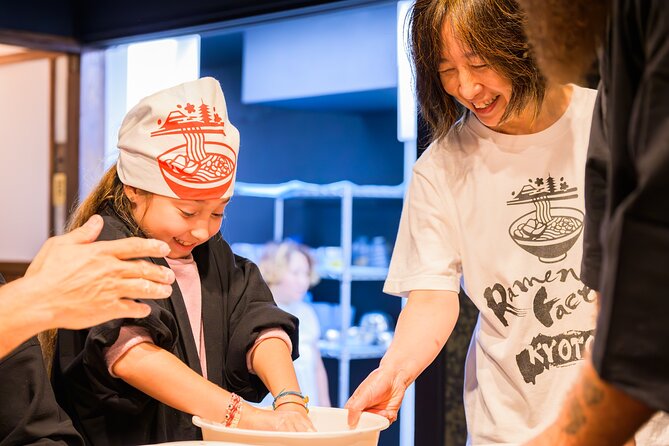 Gyoza Cooking Class in Kyoto: Traditional Japanese Dumplings - Cooking the gyoza in a professional machine