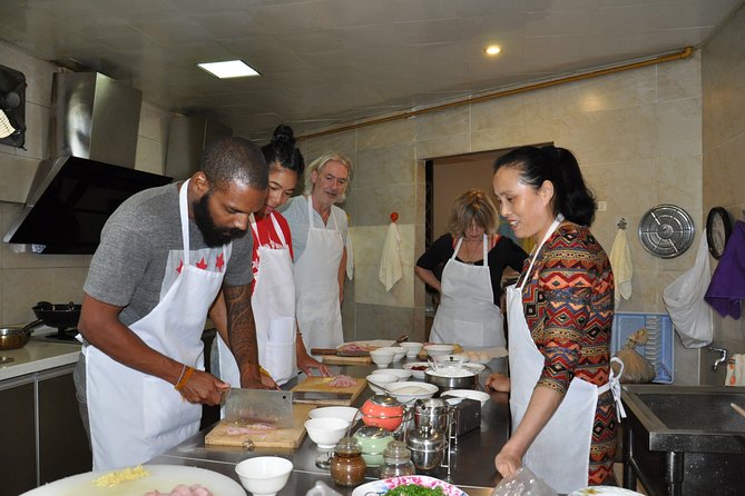 Half-Day Sichuan Cooking Class Experience in Chengdu - Cooking Sichuan food in a small Chengdu kitchen