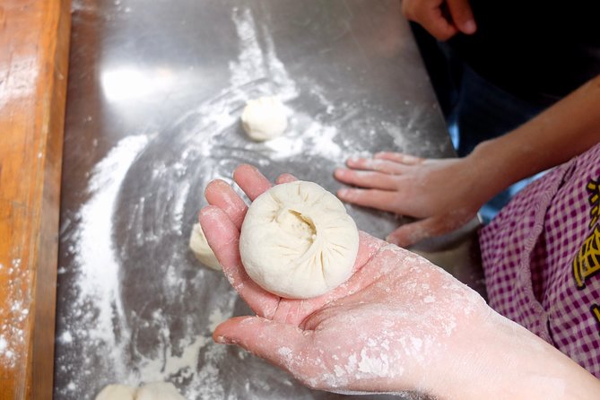 Half-Day steamed Buns Cooking Class with a Local Market Visit - Stop 1: Chilli Cool China and the local spice market