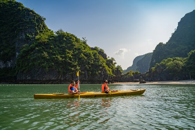 Halong Bay 2-Day Deluxe Cruise Tour including Kayaking and Cooking Demonstration - An evening on the boat, from Tai Chi to squid fishing