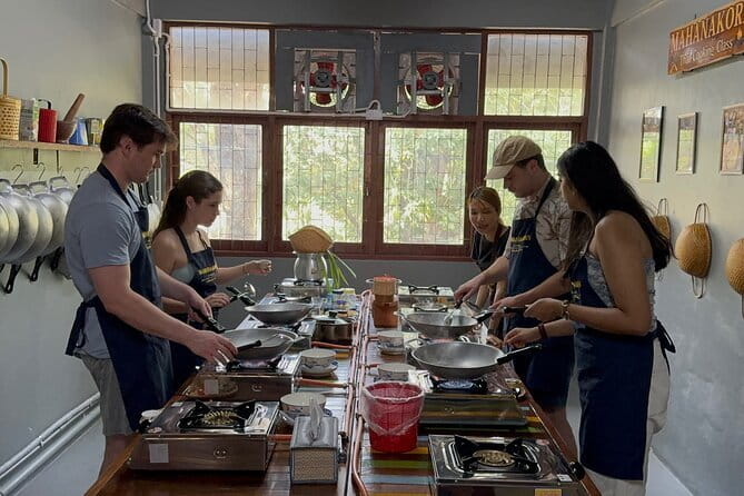 Hands-On Thai Cooking Class Bangkok with Local Chef (Small Group) - Cooking four Thai dishes with Chef Joyce
