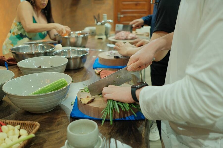 Hanoi Cooking Class: Market Tour, Free Recipe & Beverages - The chefs shape the mood
