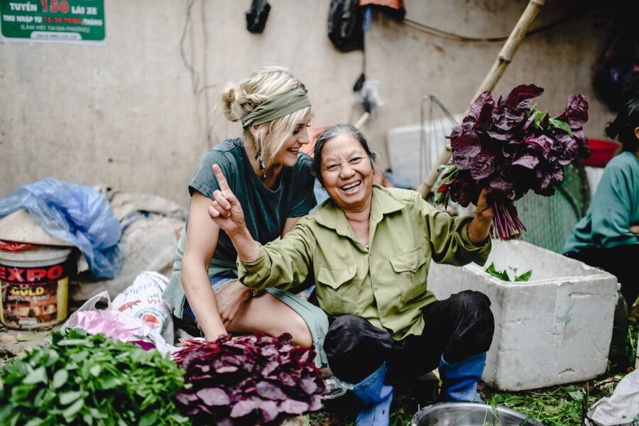 Hanoi Farm Tour and Cooking Class with Local Family - Walking through the crops near the market