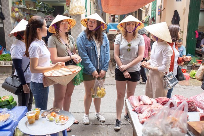 Hanoi Maya Kitchen: Traditional Cooking Class & Market Tour - Rolling, chopping, and mixing in the kitchen